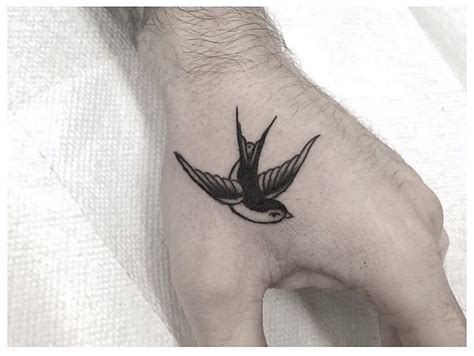 10 Stunning Bird on Finger Tattoo Ideas for Nature Lovers